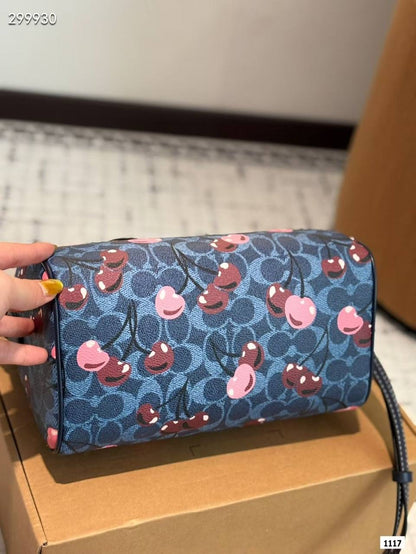 Coach Rowan Satchel Bag with Cherry Print.
