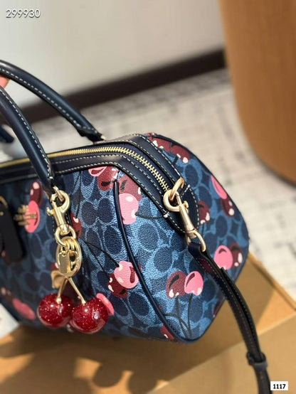 Coach Rowan Satchel Bag with Cherry Print.